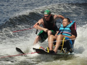 Felipe Ortez of Galveston (right) was one of about 100 participants in the 2010 Moody Gardens Adaptive Sports Festival.  