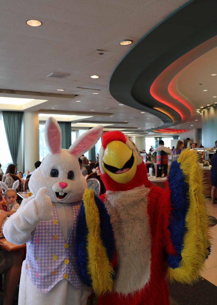 The Easter Bunny and Scarlet the Moody Gardens McCaw Mascot during the Easter Brunch in the Gardens Restaurant